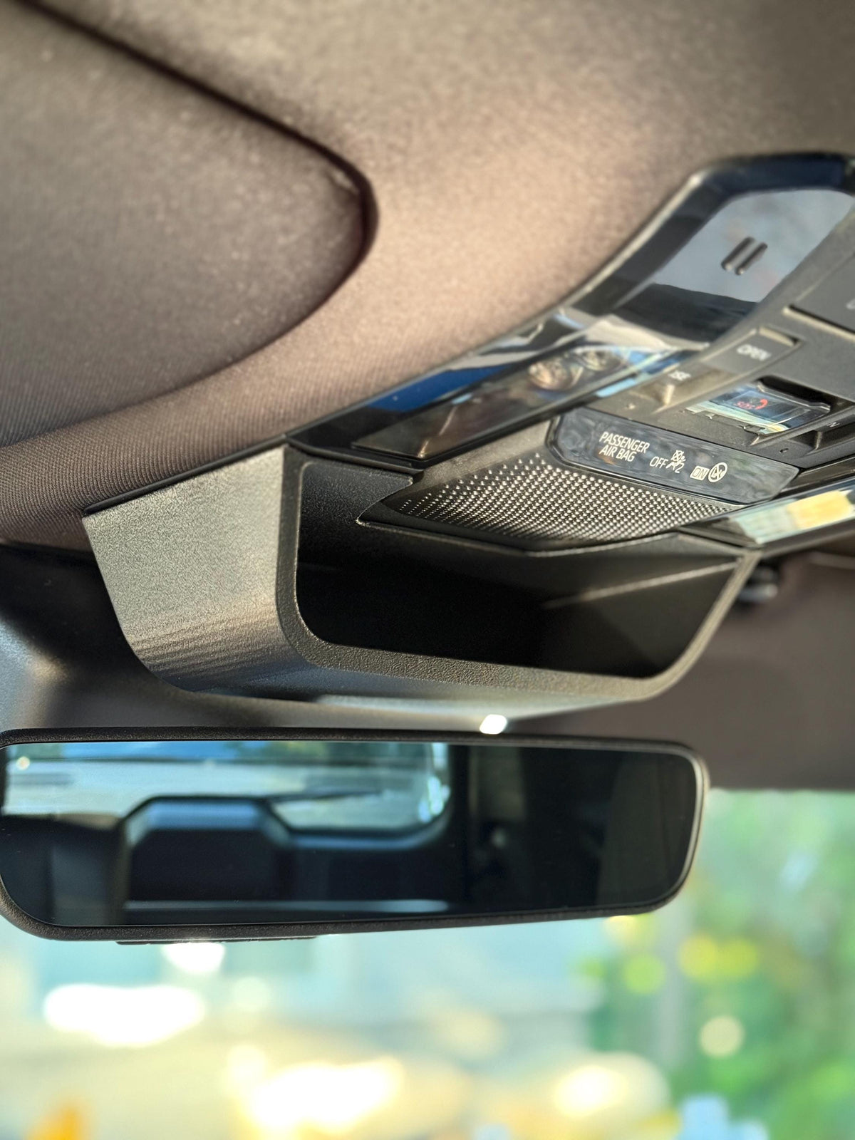 OEM-style overhead storage accessory installed in Toyota Land Cruiser 250